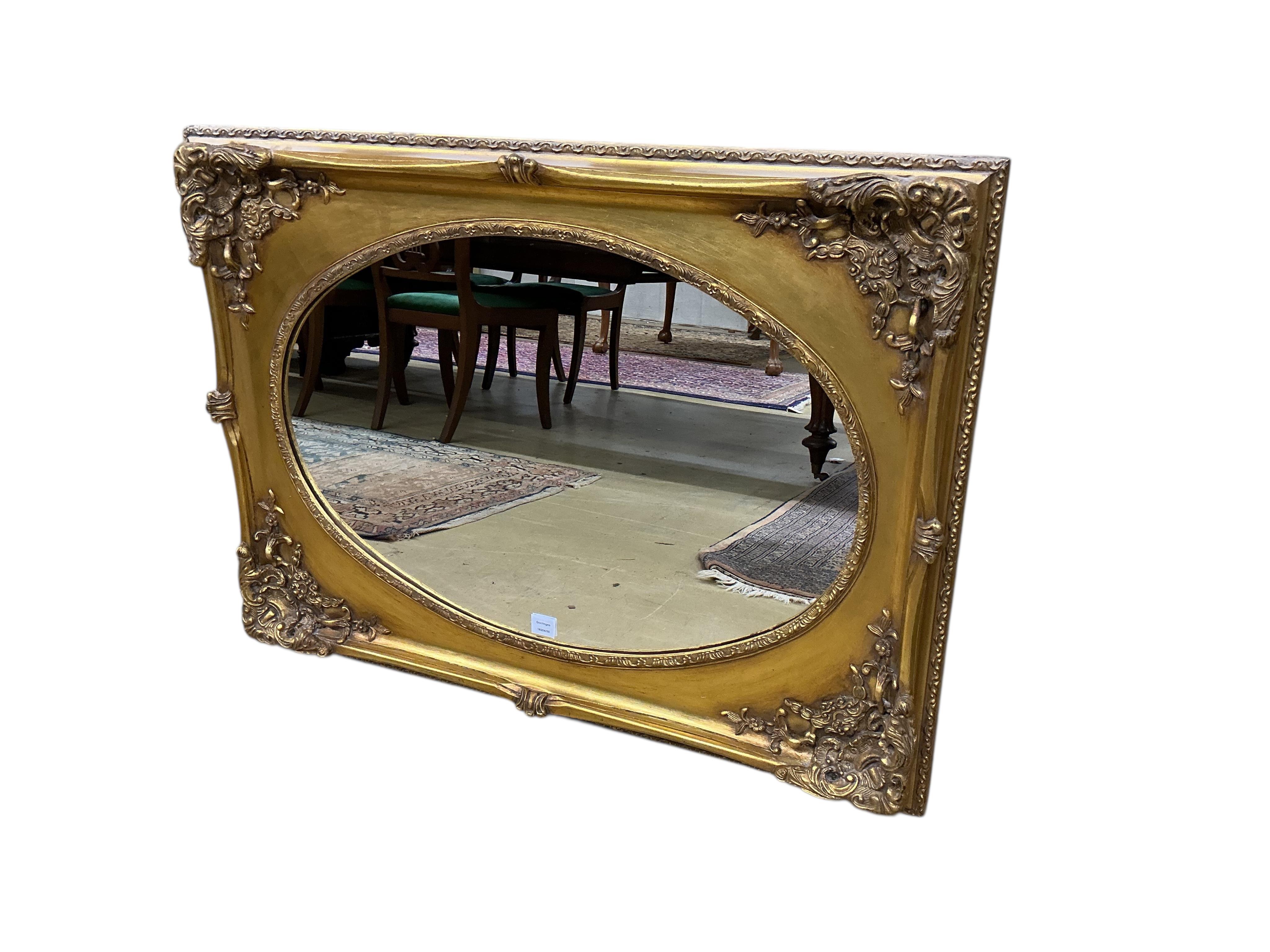 A Victorian style rectangular gilt composition wall mirror, width 114cm, height 84cm